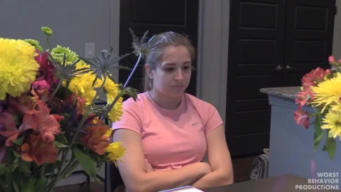 Teen blonde gets spanked on couch with brunette