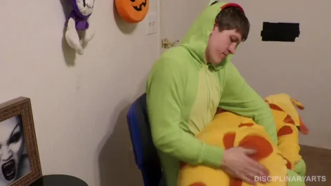 Teen girl in yellow onesie gets intimate with guy in green